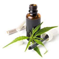 Cannabis leaf and medicine bottle